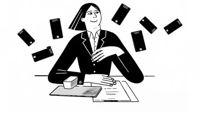 Illustration: Person am Schreibtisch, umgeben von klingelnden Telefonen